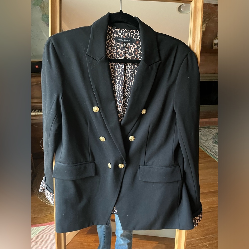 Double breasted black blazer with leopard lining